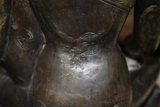 A large Tibetan bronze seated figure of Buddha Shakyamuni, probably 13th century, height 39.5cm, minor old repairs